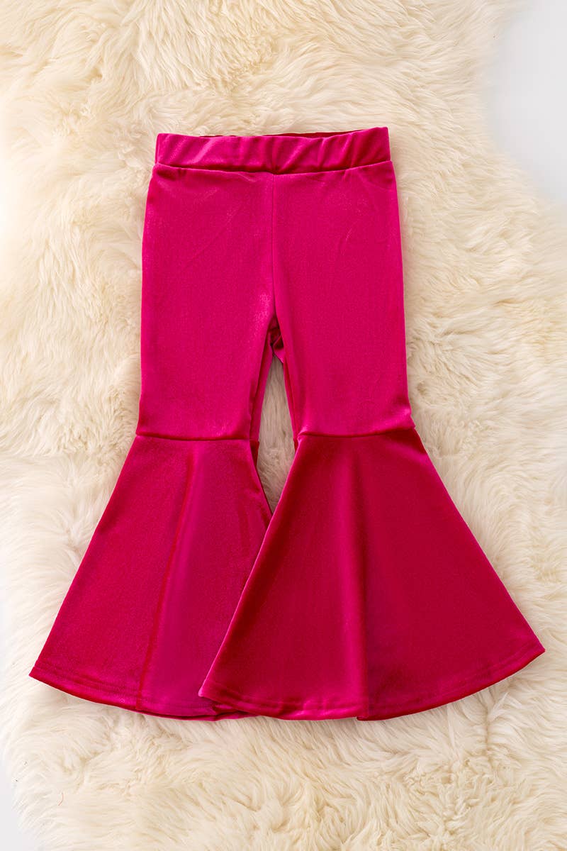 Fuchsia velvety bell bottoms.