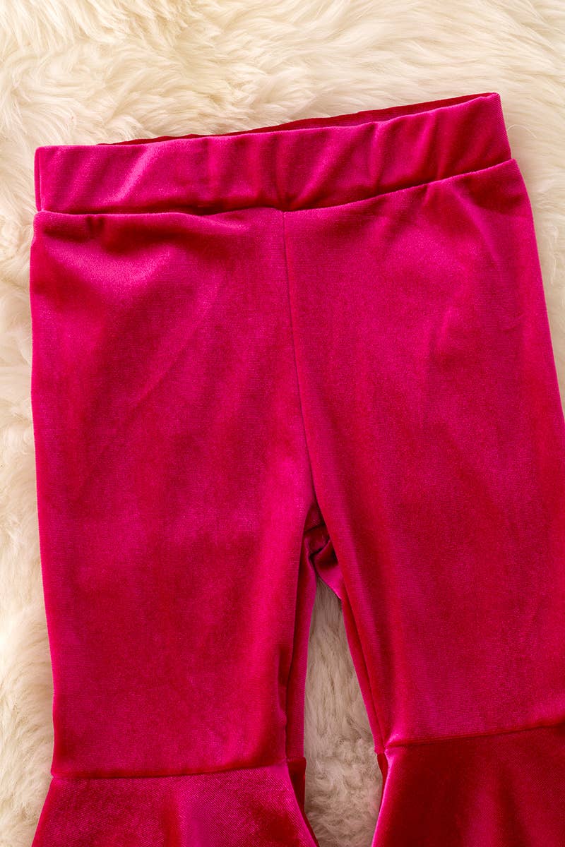 Fuchsia velvety bell bottoms.