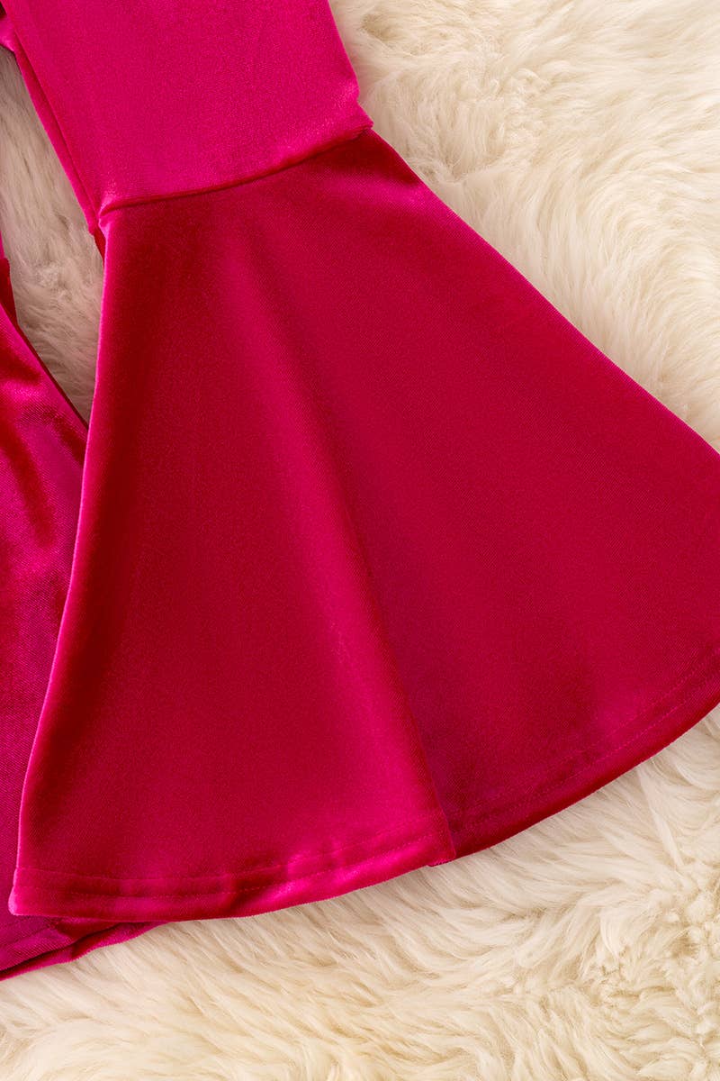 Fuchsia velvety bell bottoms.