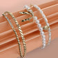 BOW PEARL RHINESTONE BAR STRETCH BANGLE SET