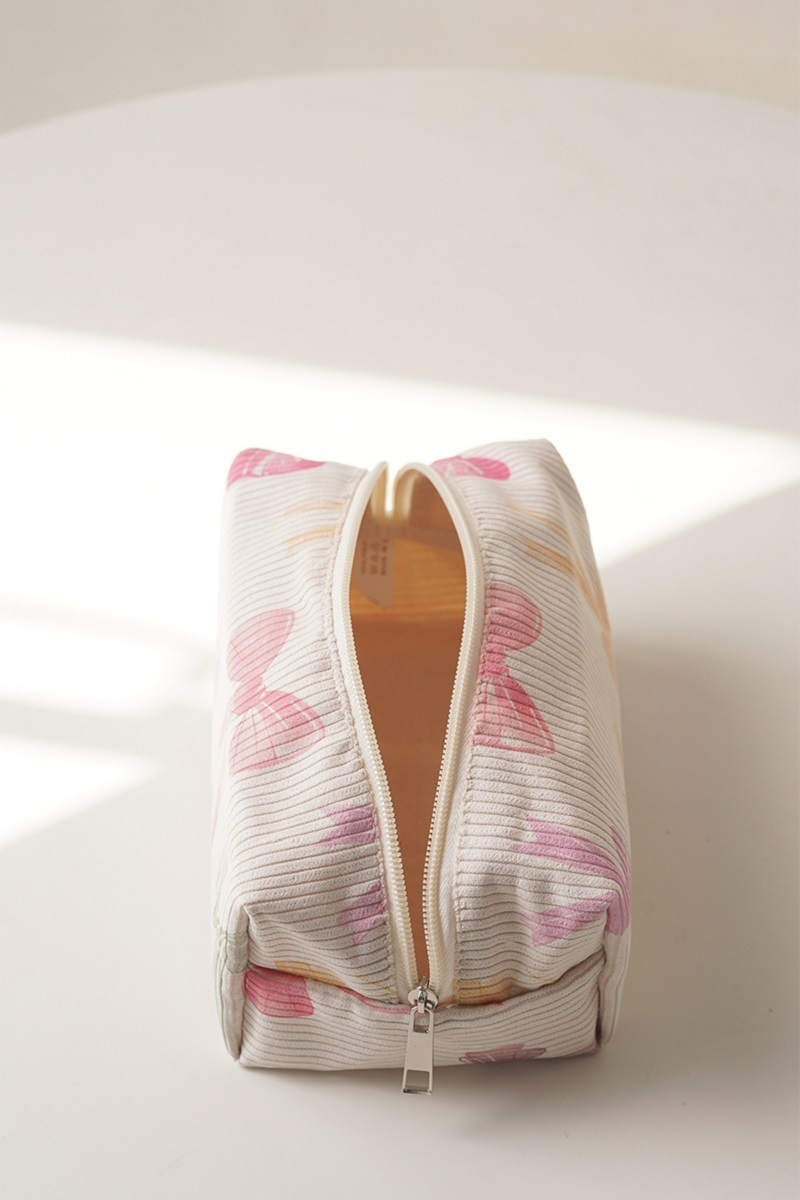 Multi Color Bows on Cream Cosmetic Bag