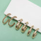 TRIO HUGGLE HOOP TITANIUM POST EARRINGS | 80E5808: GOLD
