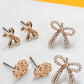 TRIO STUD BOW FLORAL PEARL BOW TRIO EARRINGS | 80E6912: GOLD